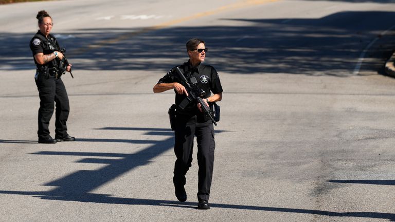 Armed police stand guard as the search for escaped convict Danelo Cavalcante continues in Pottstown
Pic:AP
