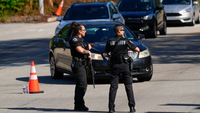 Armed police  officers stand guard as the search for escaped convict Danelo Cavalcante continues in Pottstown 
Pic:AP