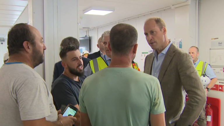 Prince William talked to builders about mental health during a visit to a construction site in west London.