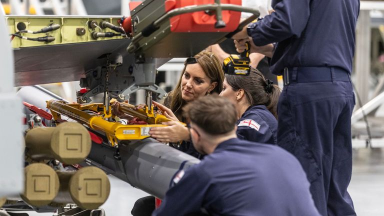 The Princess of Wales helps load a training "Sea Venom" anti ship missile onto a Royal Navy Wildcat helicopter during a visit to the Royal Naval Air Station (RNAS) Yeovilton, near Yeovil in Somerset, one of the Royal Navy's two principal air stations and one of the busiest military airfields in the UK. Picture date: Monday September 18, 2023.