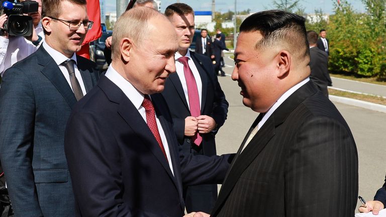 Russian President Vladimir Putin, left, and North Korea&#39;s leader Kim Jong Un shake hands during their meeting at the Vostochny cosmodrome outside the city of Tsiolkovsky, about 200 kilometers (125 miles) from the city of Blagoveshchensk in the far eastern Amur region, Russia, on Wednesday, Sept. 13, 2023. (Vladimir Smirnov, Sputnik, Kremlin Pool Photo via AP)