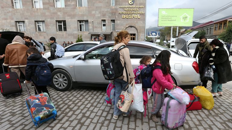 Refugees from Nagorno-Karabakh region arrive at a temporary accommodation centre in the town of Goris, Armenia