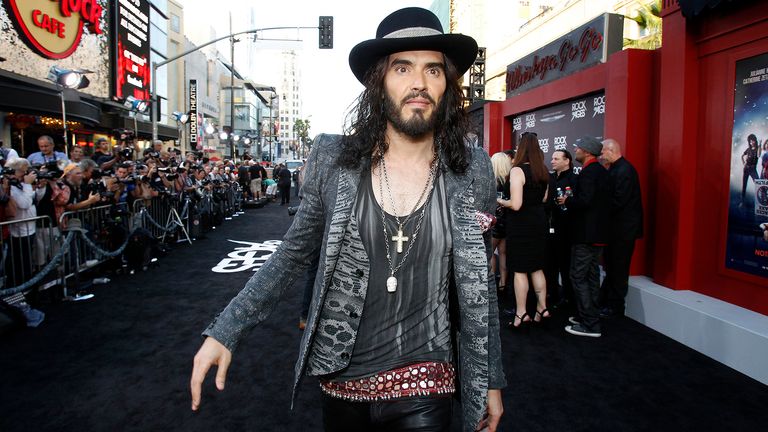 Cast member Russell Brand arrives at the premiere of "Rock of Ages" at the Grauman&#39;s Chinese theatre in Hollywood, California June 8, 2012. The movie opens in the U.S. on June 15.   REUTERS/Mario Anzuoni  (UNITED STATES - Tags: ENTERTAINMENT)