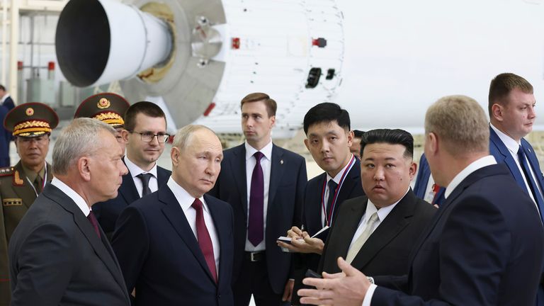 Russian President Vladimir Putin and North Korea&#39;s leader Kim Jong Un examine a rocket assembly hangar during their meeting at the Vostochny cosmodrome outside the city of Tsiolkovsky, about 200 kilometers (125 miles) from the city of Blagoveshchensk in the far eastern Amur region, Russia, on Wednesday, Sept. 13, 2023. Russian Federal Space Corporation Roscosmos CEO Yuri Borisov is on the left. (Artyom Geodakyan, Sputnik, Kremlin Pool Photo via AP)