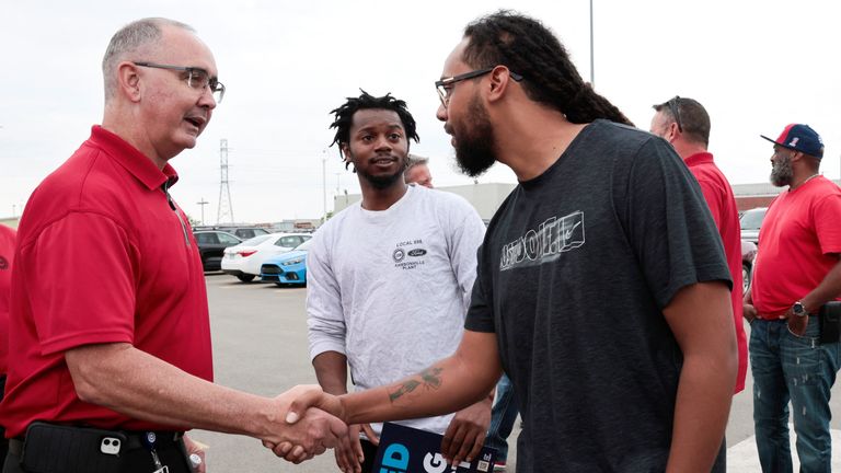 United Auto Workers President Shawn Fain greets workers at the Ford Motor Michigan Assembly Plant, to mark the beginning of contract negotiations in Wayne, Michigan, U.S. July 12, 2023. REUTERS/Rebecca Cook
