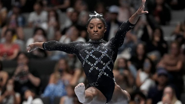 FILE - Simone Biles competes on the beam during the U.S. Gymnastics Championships, Aug. 27, 2023, in San Jose, Calif. Biles was named to the five-woman U.S. team that will head to the 2023 world championships in Belgium in early October. The 26-year-old has won 19 gold medals and 25 medals overall at the world championships during her career. (AP Photo/Godofredo A. V..squez, File)