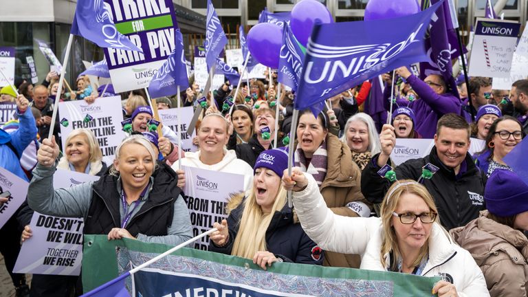 School support staff members of Unison during a rally outside the Scottish parliament in Holyrood, Edinburgh. Essential school staff including cleaners, janitors and support workers have been locked in a pay dispute, with a new offer estimated to cost �580 million. Picture date: Wednesday September 27, 2023.