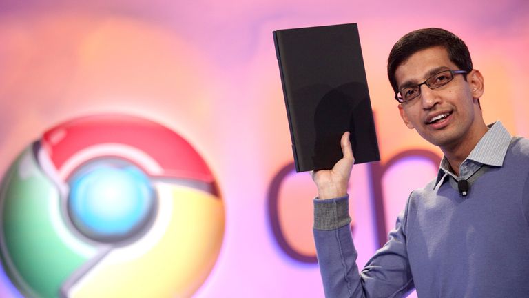 Sundar Pichai, vice president of product management for Google, holds a netbook that runs the company&#39;s Chrome OS during the company&#39;s event in San Francisco December 7, 2010. REUTERS/Beck Diefenbach (UNITED STATES - Tags: SCI TECH BUSINESS)