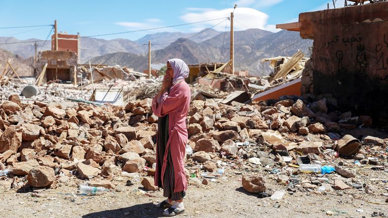 A woman reacts near the rubble of a building in the aftermath of a deadly earthquake in Talat N&#39;yaaqoub, Morocco, September 11, 2023. REUTERS/Hannah McKay.