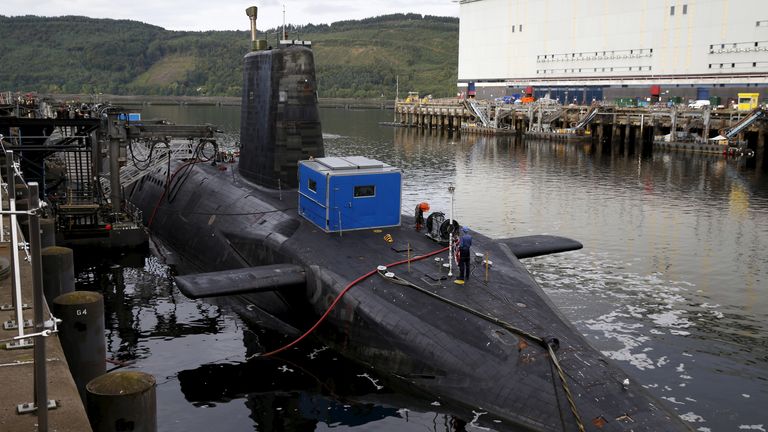 A nuclear submarine is seen at the Royal Navy&#39;s submarine base at Faslane, Scotland, August 31, 2015. Britain will spend more than 500 million pounds ($769.5 million) refurbishing its nuclear submarine base in Scotland over the next 10 years, finance minister George Osborne said on Monday. REUTERS/Russell Cheyne
