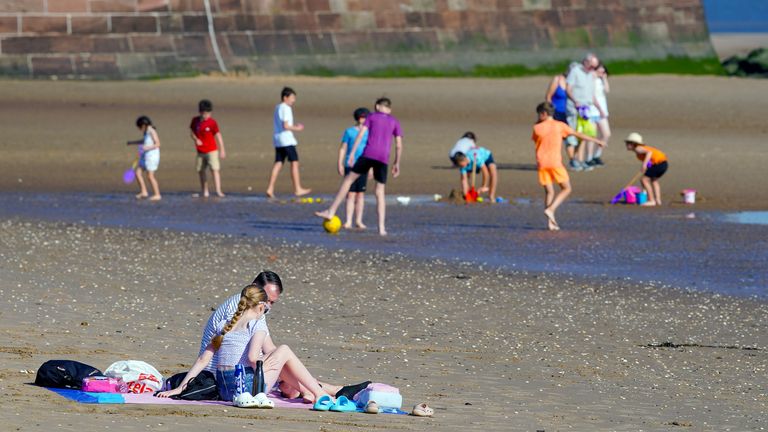 People on the beach at New Brighton. Picture date: Monday September 4, 2023.