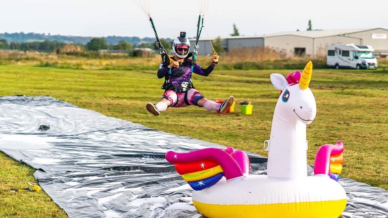 Skydiver lands on inflatable unicorn