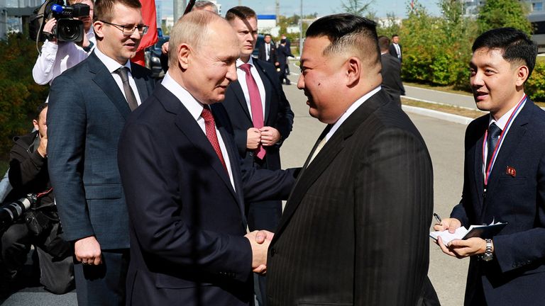 Russia&#39;s President Vladimir Putin shakes hands with North Korea&#39;s leader Kim Jong Un during a meeting at the Vostochny Сosmodrome in the far eastern Amur region, Russia