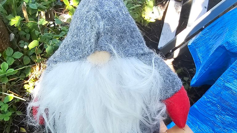 Christmas gnome which police may be &#39;calling card&#39; for burglars. Pic: North Wales Police