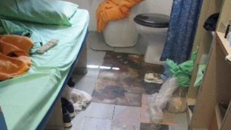 Litter-strewn cell with toilet. Pic: His Majesty&#39;s Chief Inspector of Prisons
