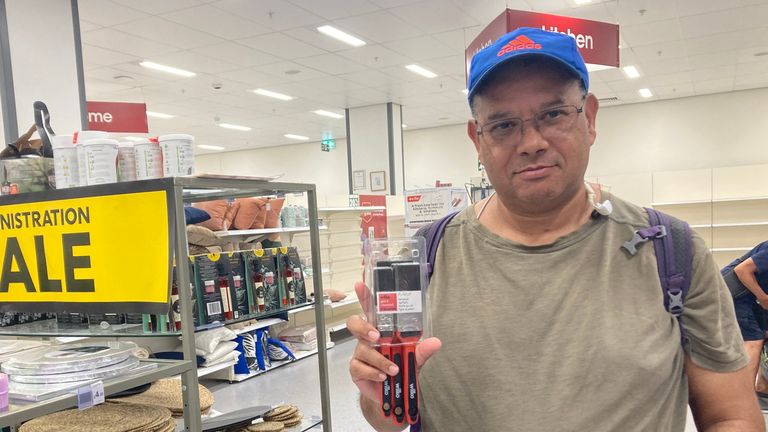 Customer Donovan Julies in a Wilko store in Acton, one of the 24 outlets due to close on Tuesday.
