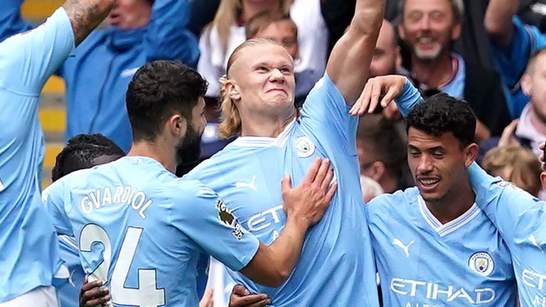 Erling Haaland celebrates his goal with Man City team-mates