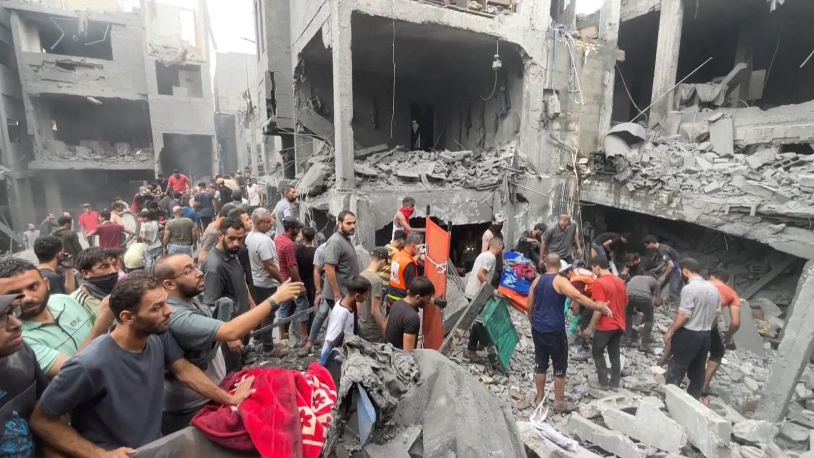 Israel-hamas War: People Search Rubble After Airstrike Hits Houses In 