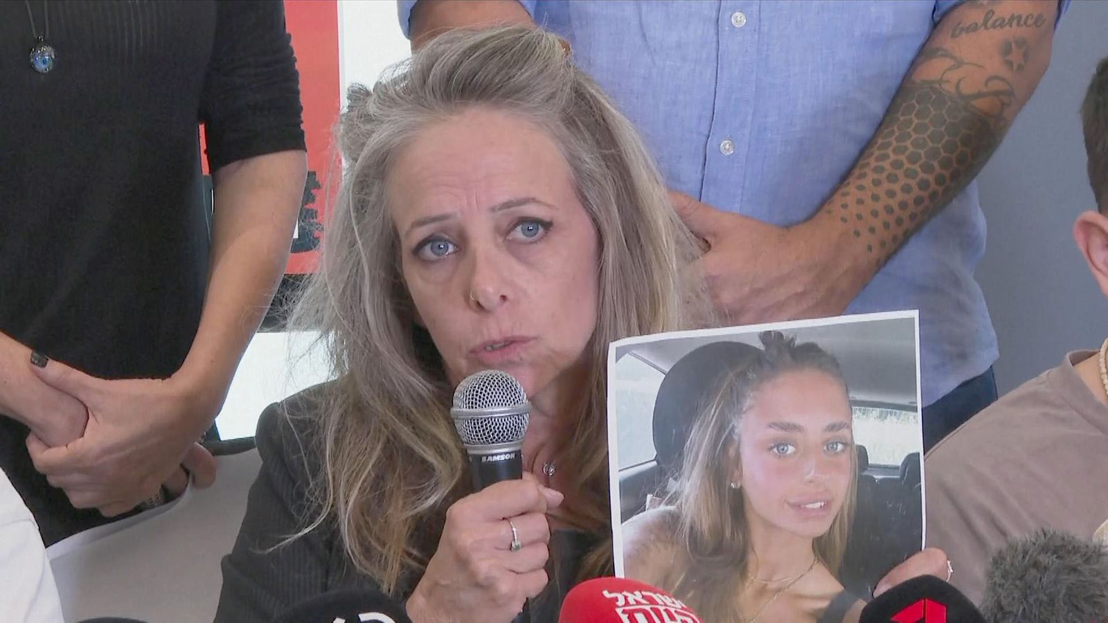 Israel-Hamas war: Mother of woman seen in hostage video pleads for help, saying 'bring my baby back home'