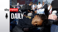A child sleeps as Palestinians with dual citizenship gather outside Rafah border crossing with Egypt in the hope of getting permission to leave Gaza, amid the ongoing Israeli-Palestinian conflict, in Rafah in the southern Gaza Strip October 16, 2023. REUTERS/Ibraheem Abu Mustafa 
