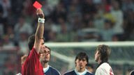 FILE - England&#39;s David Beckham receives a red card from Danish referee Kim Milton Nielsen for kicking Argentina&#39;s Diego Simeone, during England&#39;s World Cup second round soccer match against Argentina, in Saint Etienne, France on June 30, 1998. England lost on penalties after the match ended 2-2. A four-part Netflix series, "Beckham," explores Beckham’s upbringing and his triumphs on the field, but perhaps the most difficult part was revisiting his painful sending off during England’s World Cup m