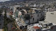 Damaged buildings stand after Hurricane Otis ripped through Acapulco, Mexico, Thursday, Oct. 26, 2023. The hurricane that strengthened swiftly before slamming into the coast early Wednesday as a Category 5 storm has killed at least 27 people as it devastated Mexico&#39;s resort city of Acapulco. (AP Photo/Felix Marquez)