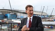 British Chancellor of the Exchequer Jeremy Hunt tours nearby the construction site of the Co-op Live indoor entertainment arena during Britain&#39;s Conservative Party&#39;s annual conference in Manchester, Britain, October 2, 2023. REUTERS/Toby Melville/Pool