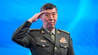 Li Shangfu salutes before delivering a speech. PIC: AP