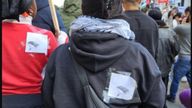 Met counter terrorism detectives are releasing images of four people they would like to speak to in relation to two alleged incidents and are asking the public get in touch if they can help identify them.. Social media footage of a pro-Palestine protest in Whitehall on Saturday, 14 October shows two women with images of paragliders on their tops.
