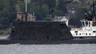 One of the Royal Navy&#39;s seven Astute-class nuclear-powered attack submarine moves through the water at the entrance to Holy Loch and Loch Long near Kilcreggan, in Argyll and Bute.
