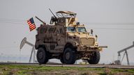 FILE - A US military vehicle on a patrol in the countryside near the town of Qamishli, Syria, on Dec. 4, 2022. Syria&#39;s U.S.-backed and Kurdish-led forces on Tuesday, Sept. 5, 2023 pushed deeper into the last stronghold of Arab tribesmen who have taken up arms against them in eastern Syria as a spokesperson said they hoped to end the dayslong clashes there in the ...next 24 hours.... (AP Photo/Baderkhan Ahmad, File)