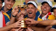 The Europe team led by Europe&#39;s Team Captain Luke Donald, at centre lift the Ryder Cup after winning it at the Marco Simone Golf Club in Guidonia Montecelio, Italy, Sunday, Oct. 1, 2023. (AP Photo/Alessandra Tarantino)