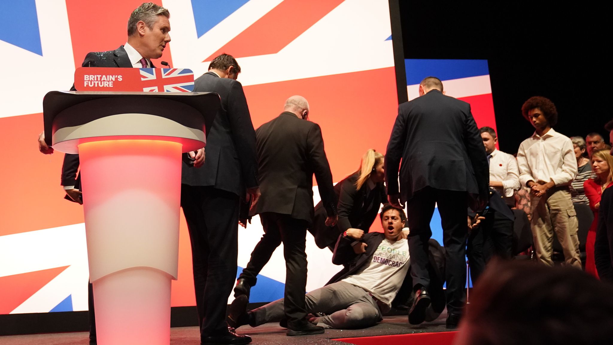 Glitter thrown over Sir Keir Starmer during speech - protester arrested ...