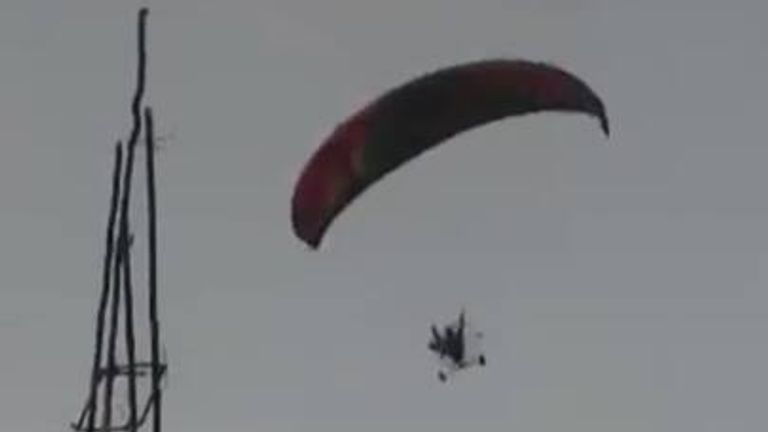 Hamas fighters appear to cross Israeli border with paragliders