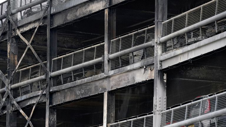 Fire damage at a multi-storey car park at Luton Airport