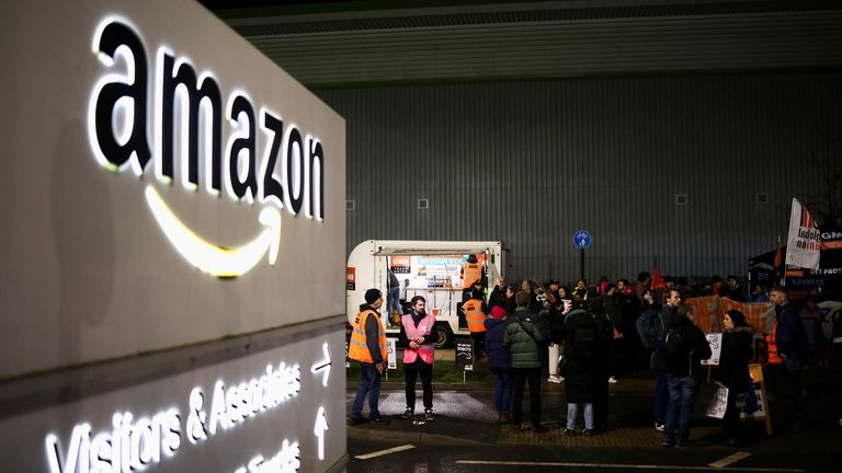 People take part in a rally in support of Amazon workers&#39; on strike