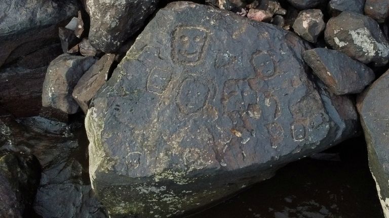 A view of ancient stone carvings on a rocky point of the Amazon river that were exposed after water levels dropped to record lows during a drought in Manaus, Amazonas state, Brazil October 23, 2023. REUTERS/Suamy Beydoun
