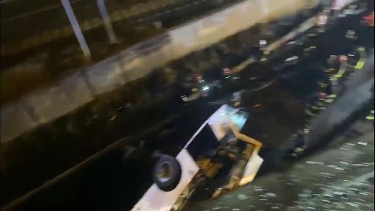 Coach crashes off overpass in Italy