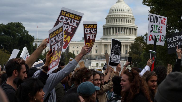 Protesters march past the U.S. Capitol building as they take part in a protest calling for a ceasefire in Gaza, in Washington, U.S., October 18, 2023. REUTERS/Leah Millis
