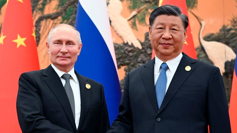 Vladimir Putin and Xi Jinping pose at the Belt and Road Forum in Beijing, China.  Photo: AP