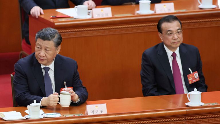 A file photo shows Chinese President Xi Jinping and former Premier Li Keqiang during the China&#39;s National People&#39;s Congress (NPC) at the Great Hall of the People in Beijing, China on March 11, 2023. Li Keqiang has died at the age of 68, state media said on Oct. 27, 2023.( The Yomiuri Shimbun via AP Images )
