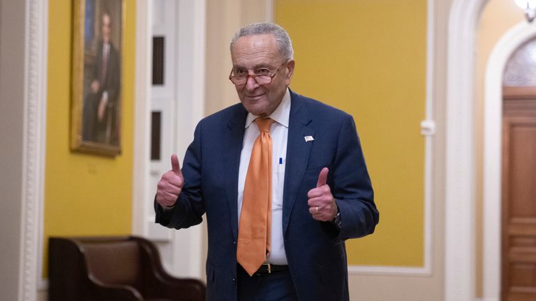 Democrat Chuck Schumer gave a thumbs up as the threat of a shutdown was averted. Pic: AP