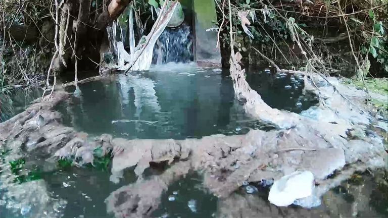 Sewage spills at river site