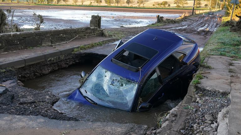 A car on a bridge washed away near Dundee