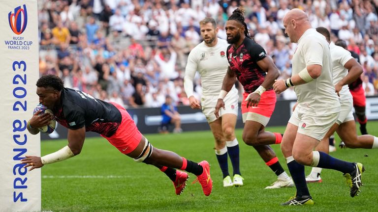 Fiji&#39;s Viliame Mata scores his side&#39;s opening try. Pic: AP