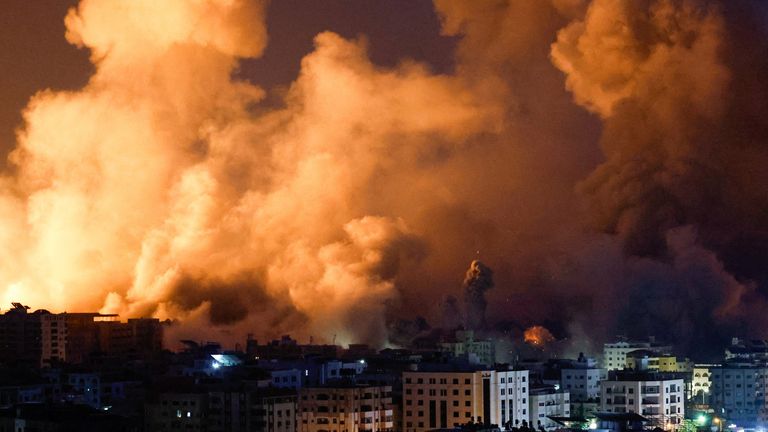 Flames and smoke billow during Israeli strikes in Gaza 