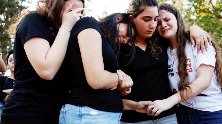 Friends and family attend the funeral of Lianne Sharabi and her daughters Noiya Sharabi, 16, and Yahel Sharabi, 13