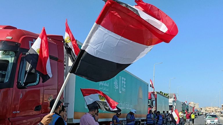 A convoy of Egyptian NGO trucks carrying humanitarian aid to Gaza waits for an agreement on the Rafah border crossing