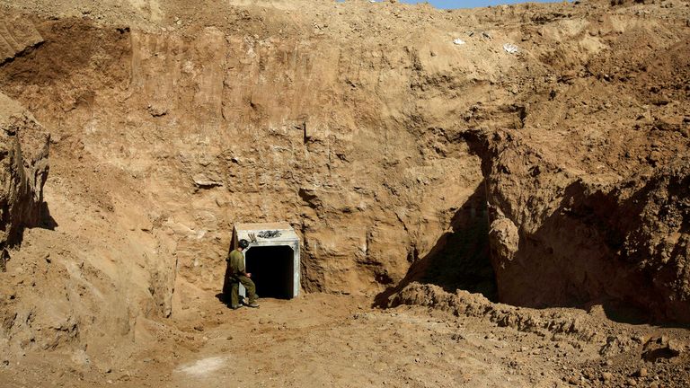 An Israeli soldier stands at the exit of one of the &#39;web of tunnels&#39; near the Gaza border used as a strategic threat to Israel File Pic: AP 