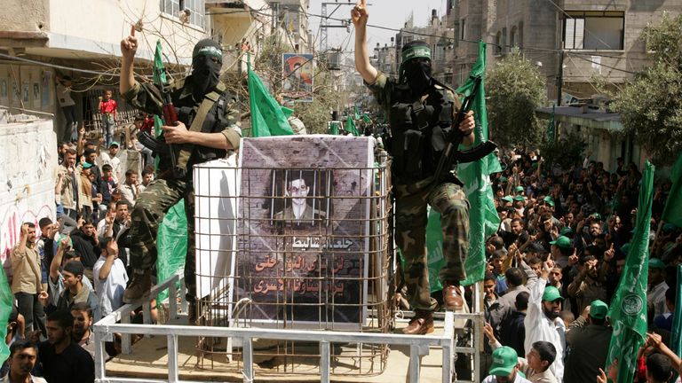 Hamas militants with a picture of Gilad Shalit in Jabalya, Gaza in 2007
